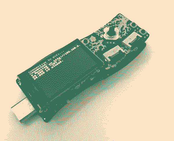 The EMF Tidal badge, a small dongle-like device with a display and USB-C connector The EMF Tidal badge, a small dongle-like device with a display and USB-C connector